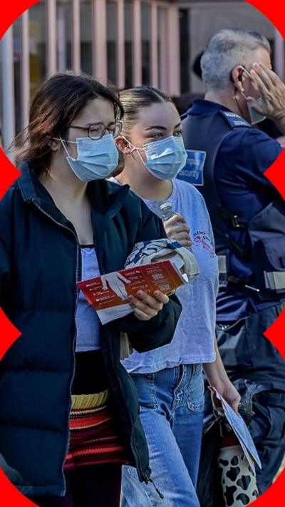 Two girls in masks